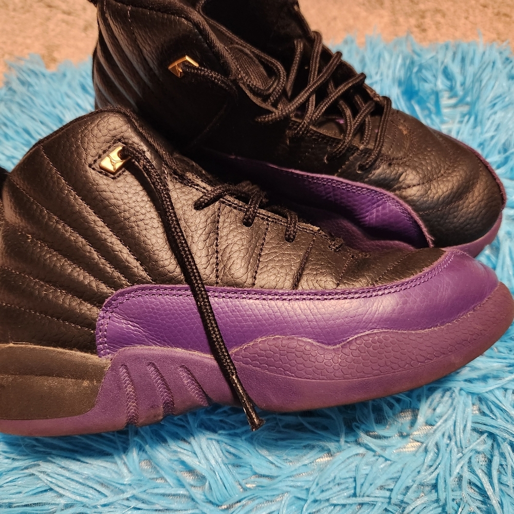 Purple and black jordans size 2.5y